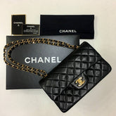 CHANEL Black Lambskin GHW Quilted Double Flap Handbag