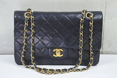 CHANEL Black Lambskin 25 Double Flap Handbag