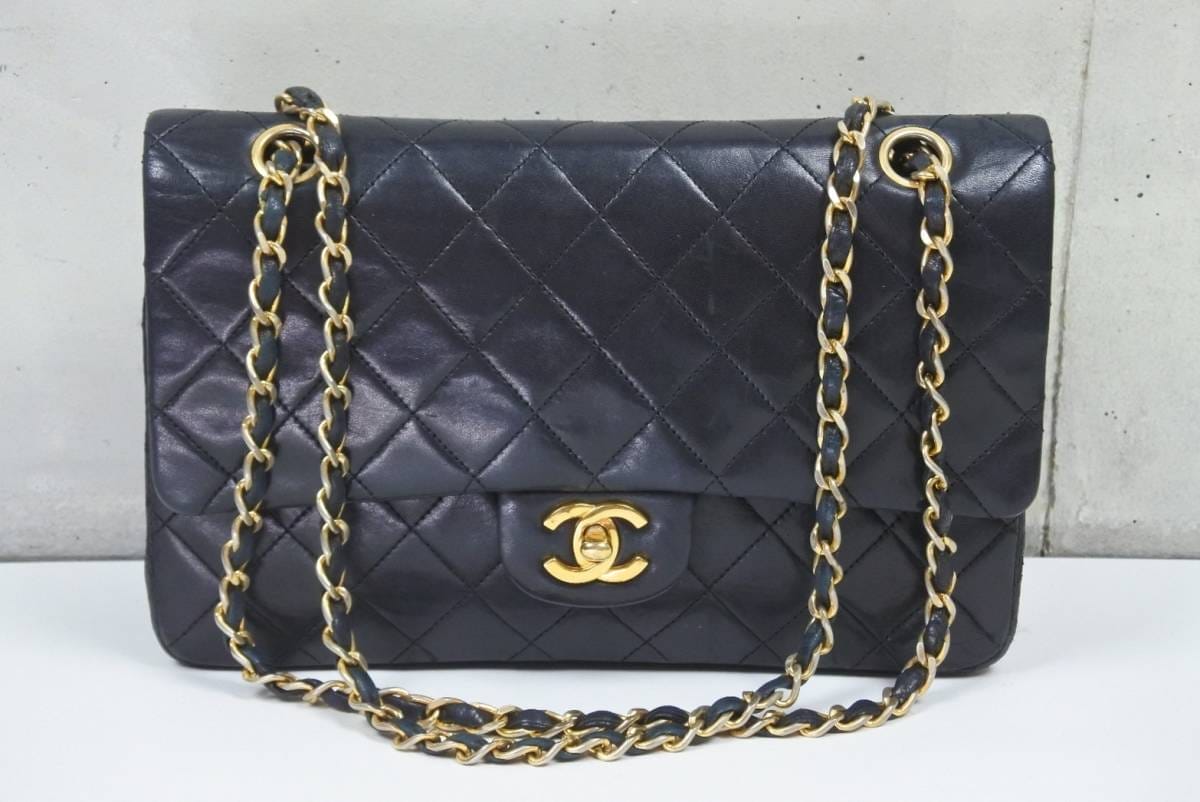 CHANEL Black Lambskin 25 Double Flap Handbag