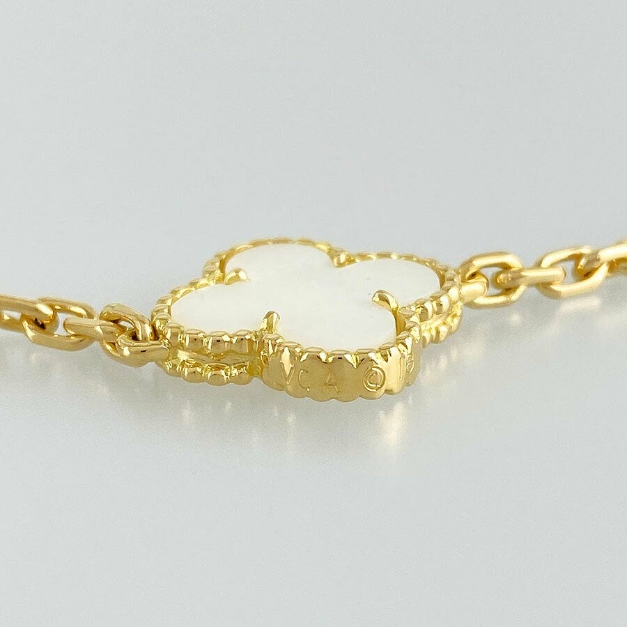 Van Cleef & Arpels Mother of Pearl 18KT Yellow Gold Vintage Alhambra 9-motif Necklace